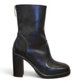Tronchetto nero in pelle con tacco alto e zip